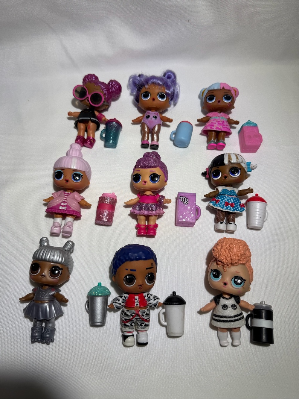 L.O.L. Surprise! Mini Doll Lot in Pink, Purple, Blue, Silver